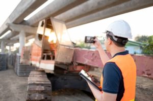 Construction Manager Managing Equipment Usage
